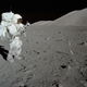 AS17-134-20426 (11 Dec. 1972) --- Scientist-astronaut Harrison H. Schmitt collects lunar rake samples at Station 1 during the first Apollo 17 extravehicular activity (EVA) at the Taurus-Littrow landing site. This picture was taken by astronaut Eugene A. Cernan, Apollo 17 commander. Schmitt is the lunar module pilot. The Lunar Rake, an Apollo Lunar Geology Hand Tool, is used to collect discrete samples of rocks and rock chips ranging in size from one-half inch (1.3 cm) to one inch (2.5 cm).
